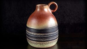 Alabaster jar of perfume.