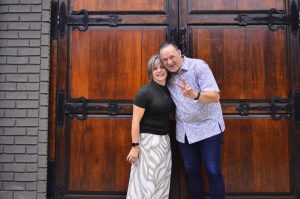 Ps Mandy and Larry at church door