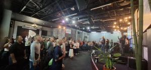 The Leader Within sermon at 3C South Coast worship service with congregation praising